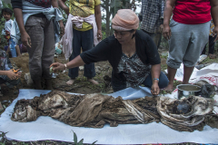 Residents were seen in the process of relocating their ancestral graves at the abandoned villages around Sinabung volcano feet which was destroyed by the eruption process. The local wisdom of the indigenous tribes who live at the foot of the Sinabung volcano, Karo, calls it 'Tulan-tulan' (Karo language), as the functions of tradition to defend artifacts (ancestral graves) from the deadly and destructive eruption of Sinabung volcano hazards impact.